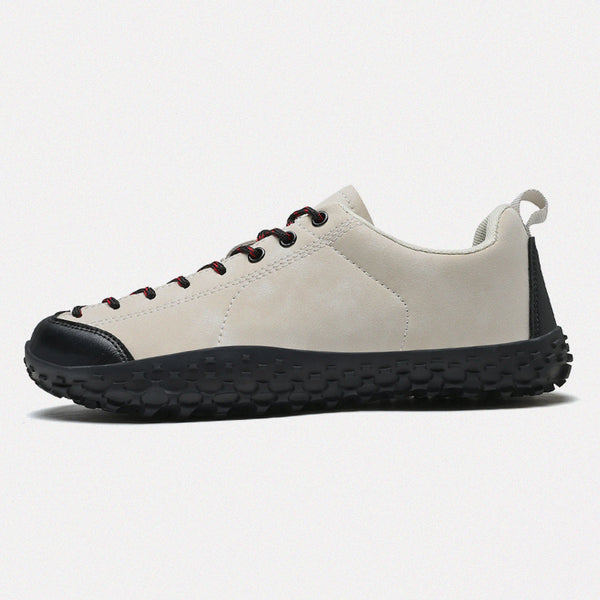 Dannto beige Veld II Pro: zapatos descalzos ligeros para hombres y mujeres mostrados desde un lado