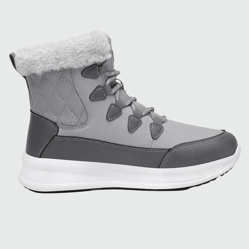 Dannto women‘s light gray winter snow Boots shown from the side