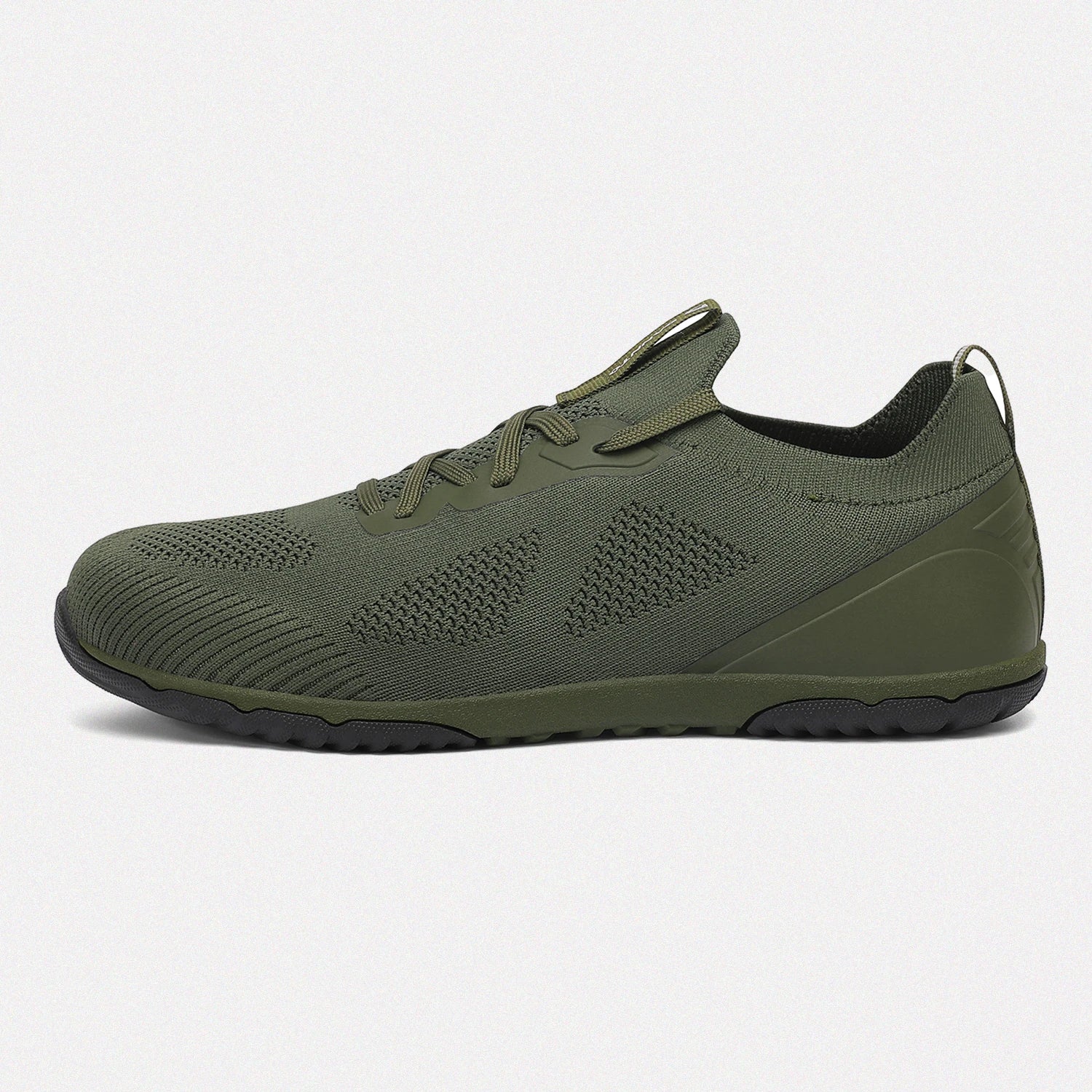 Dannto green zero drop barefoot sneakers shown from the side