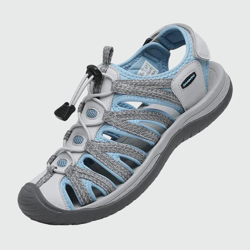 Dannto women's closed toe hiking sandals S2 white blue shown from a three quarter view