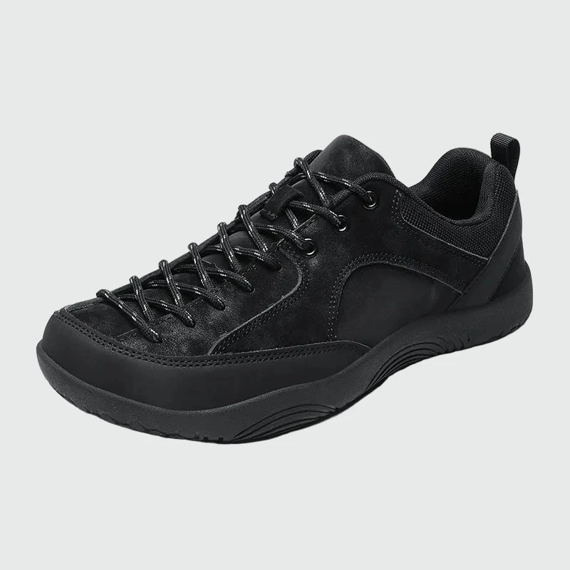 Dannto men‘s black wide toe outdoor sneakers shown from a three quarter view