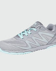 Gliss II - gray wide toe box barefoot shoes for women shown from a three quarter view