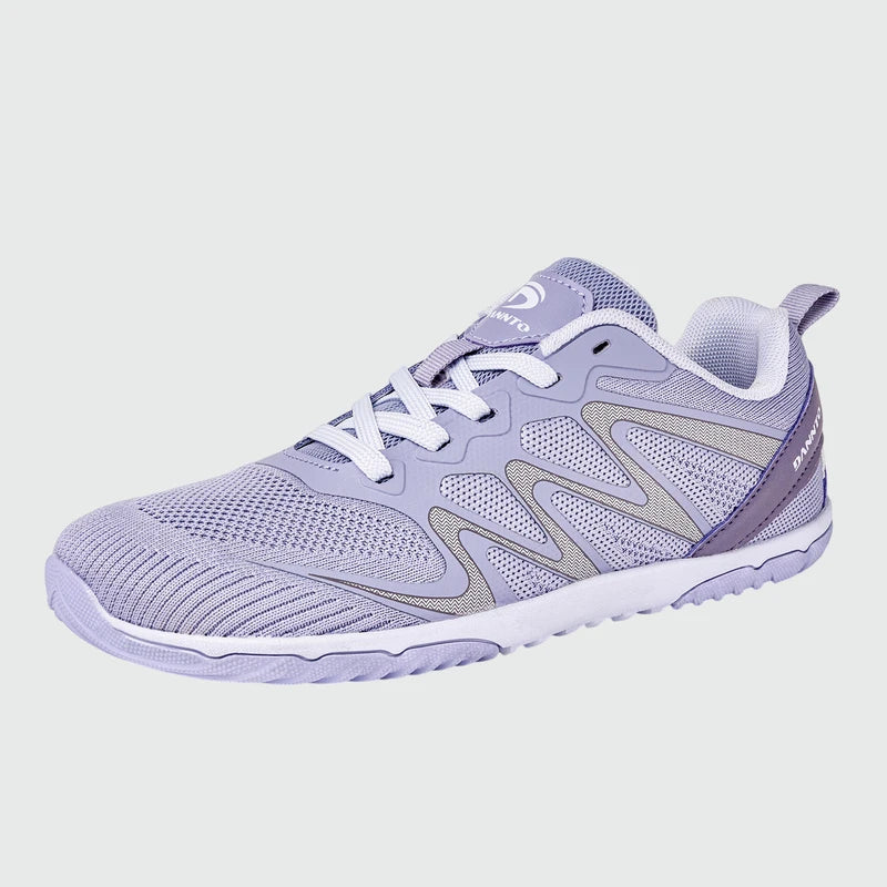 Gliss II - purple wide toe box barefoot shoes for women shown from a three quarter view